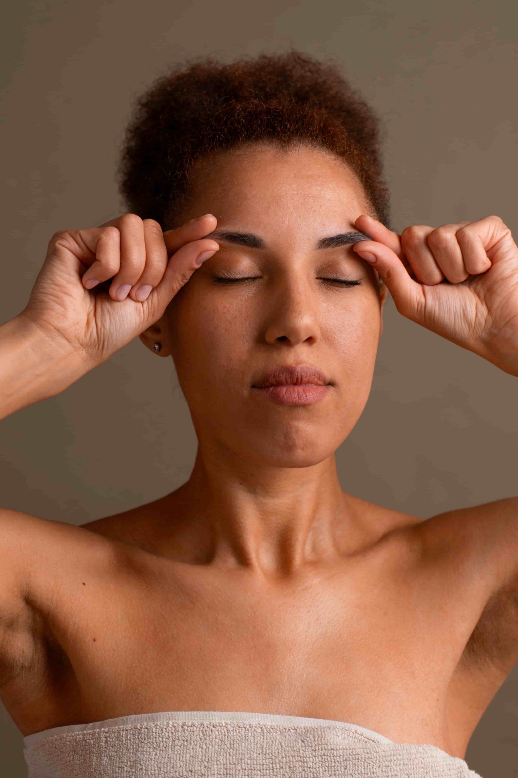 portrait woman trying facial yoga massage stay young 1 2 scaled